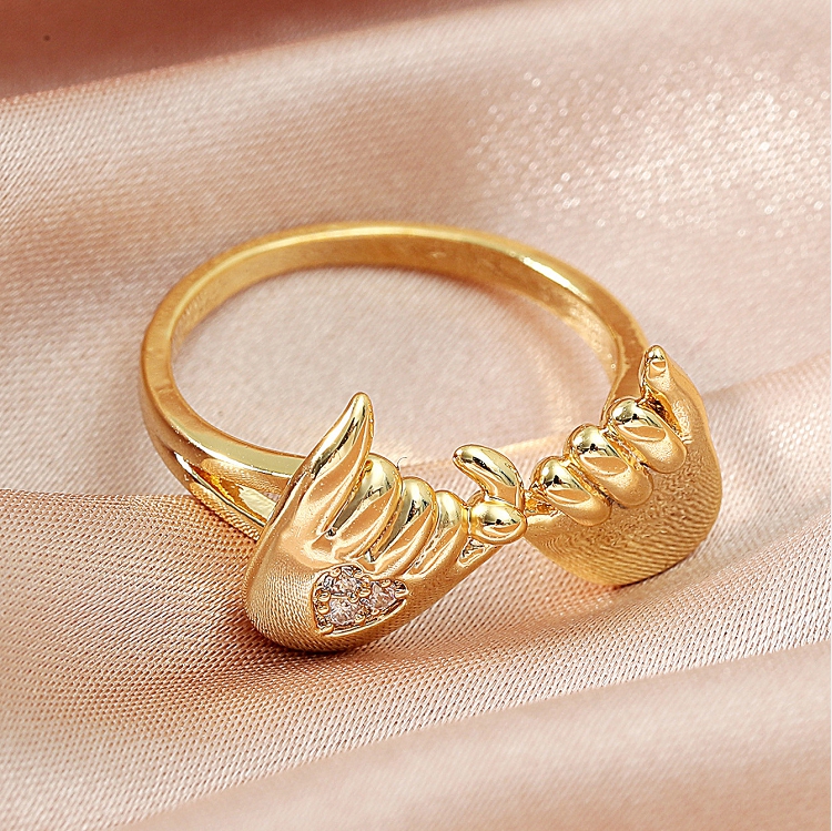 Foreign trade creative golden zircon hand ring Europe and the United States fashion retro hook couple ring ornaments wholesale ?